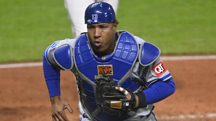 Apr 12, 2025; Cleveland, Ohio, USA; Kansas City Royals catcher Salvador Perez (13) runs to the backstop after a wild pitch in the eighth inning against the Cleveland Guardians at Progressive Field. Mandatory Credit: David Richard-Imagn Images