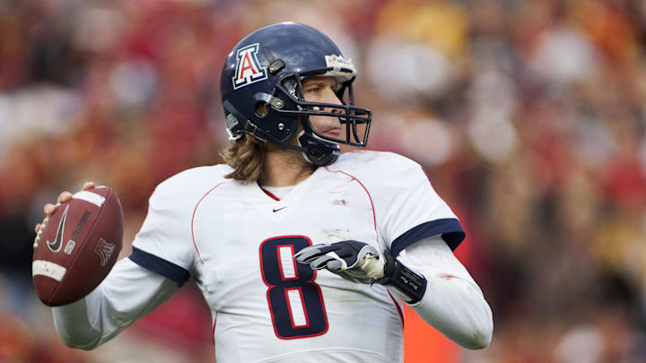 Dec 5, 2009; Los Angeles, CA, USA; FILE PHOTO; Arizona Wildcats quarterback Nick Foles (8) looks to throw against the Southern California Trojans at the Los Angeles Memorial Coliseum. Mandatory Credit: Peter Brouilet-USA TODAY NETWORK