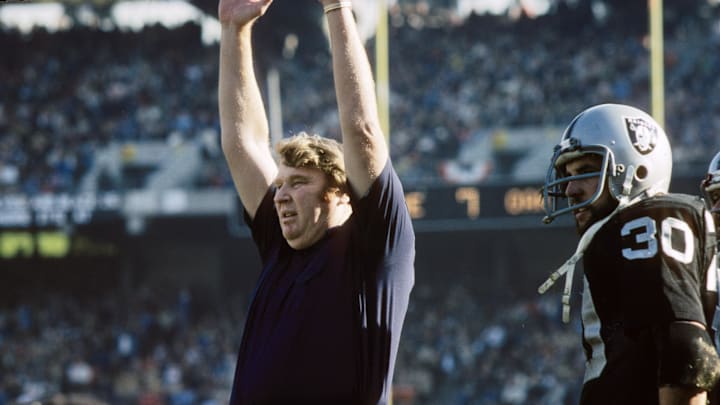 Dec 18, 1976; Oakland, CA, USA; FILE PHOTO; Oakland Raiders head coach John Madden reacts on the sideline against the New England Patriots during the 1976 AFC Wild Card Playoff game at the Oakland Coliseum. The Raiders defeated the Patriots 24-21. Mandatory Credit: Darryl Norenberg-Imagn Images