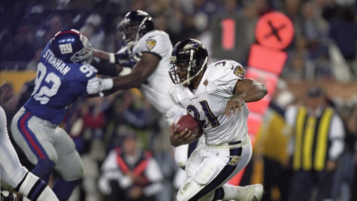 Jan 28, 2001; Tampa, FL, USA; FILE PHOTO; Baltimore Ravens running back Jamal Lewis (84) carries the ball against the New York Giants during Super Bowl XXXV. The Ravens defeated the Giants 34-7 at Raymond James Stadium. Mandatory Credit: USA TODAY Sports