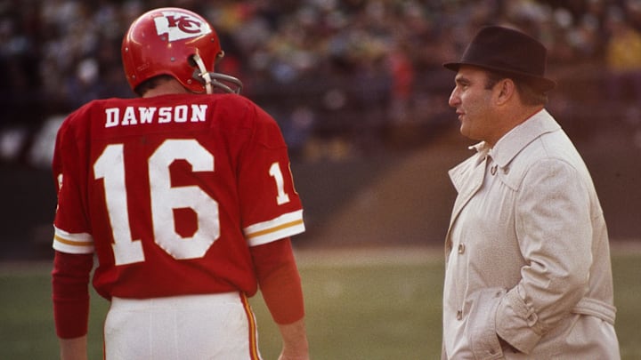 Nov 7, 1971; Flushing, NY, USA; FILE PHOTO; Kansas City Chiefs head coach Hank Stram talks to Len Dawson (16) on the sideline against the New York Jets at Shea Stadium.  Mandatory Credit: Malcolm Emmons-USA TODAY NETWORK