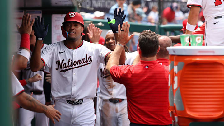 Jun 19, 2025; Washington, District of Columbia, USA; Washington Nationals outfielder James Wood (29) celebrates with teammates in the dugout after hitting a two run home run against the Colorado Rockies during the fourth inning at Nationals Park. Mandatory Credit: Geoff Burke-Imagn Images