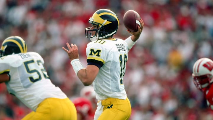 Sep 25, 1999; Madison, WI, USA; FILE PHOTO; Michigan Wolverines quarterback Tom Brady (10) in action against the Wisconsin Badgers at Camp Randall Stadium. Michigan defeated Wisconsin 21-16. Mandatory Credit: Photo By Imagn Images
