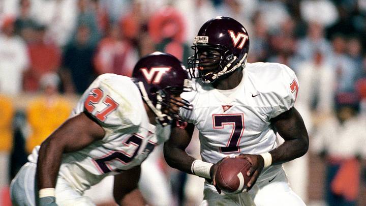 Oct 2, 1999; Charlottesville, VA, USA: FILE PHOTO; Virginia Tech Hokies quarterback Michael Vick (7) in action against the Virginia Cavaliers at the Orange Bowl.  Mandatory Credit: USA TODAY Sports