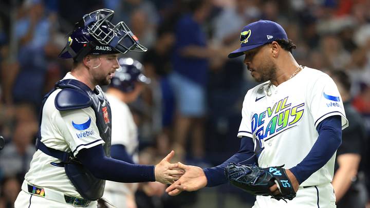 Oct 13, 2026; St. Petersburg, Florida, USA; Tampa Bay Rays catcher Liam Hicks (34) and pitcher Freddy Peralta (51) react after the top of the fifth inning against the Cleveland Guardians in game two of the ALCS for the 2026 MLB Playoffs at Tropicana Field. Mandatory Credit: Kim Klement Neitzel-Imagn Images Oct 13, 2026; St. Petersburg, Florida, USA; Tampa Bay Rays catcher Liam Hicks (34) and pitcher Freddy Peralta (51) react after the top of the fifth inning against the Cleveland Guardians in game two of the ALCS for the 2026 MLB Playoffs at Tropicana Field. Mandatory Credit: Kim Klement Neitzel-Imagn Images