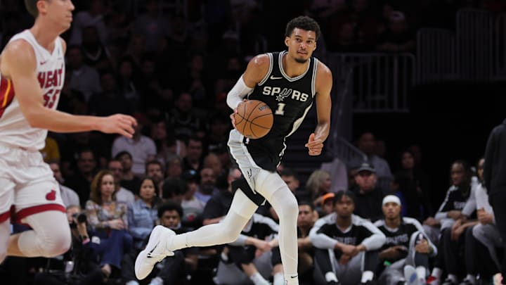 Oct 15, 2024; Miami, Florida, USA; San Antonio Spurs center Victor Wembanyama (1) dribbles the basketball against the Miami Heat during the second quarter at Kaseya Center. Mandatory Credit: Sam Navarro-Imagn Images