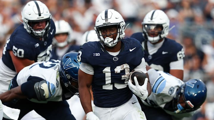 Sep 13, 2025; University Park, Pennsylvania, USA; Penn State Nittany Lions running back Kaytron Allen (13) runs with the ball into the end zone for a touchdown during the fourth quarter against the Villanova Wildcats at Beaver Stadium. Mandatory Credit: Matthew O'Haren-Imagn Images Sep 13, 2025; University Park, Pennsylvania, USA; Penn State Nittany Lions running back Kaytron Allen (13) runs with the ball into the end zone for a touchdown during the fourth quarter against the Villanova Wildcats at Beaver Stadium. Mandatory Credit: Matthew O'Haren-Imagn Images