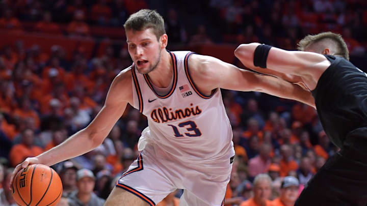 Feb 15, 2025; Champaign, Illinois, USA;  Illinois Fighting Illini center Tomislav Ivisic (13) drives around Michigan State Spartans forward Jaxon Kohler (0) during the first half at State Farm Center. Mandatory Credit: Ron Johnson-Imagn Images