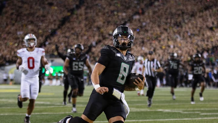 Oregon quarterback Dillon Gabriel scores a touchdown against Ohio State during the fourth quarter at Autzen Stadium Saturday, Oct. 12, 2024.