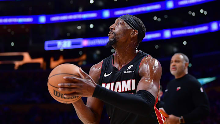 January 15, 2025; Los Angeles, California, USA; Miami Heat center Bam Adebayo (13) shoots against the Los Angeles Lakers during the first half at Crypto.com Arena. Mandatory Credit: Gary A. Vasquez-Imagn Images