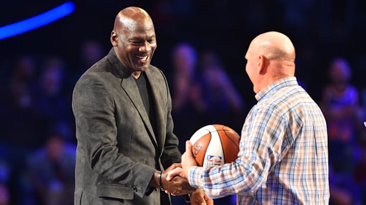 February 18, 2018; Los Angeles, CA, USA; Los Angeles Clippers owner Steve Ballmer greets Charlotte Hornets owner Michael Jordan to pass the game ball to the 2019 host during the 2018 NBA All Star Game at Staples Center. Mandatory Credit: Bob Donnan-Imagn Images

