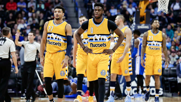 Dec 30, 2016; Denver, CO, USA; Denver Nuggets guard Emmanuel Mudiay (0) and guard Jamal Murray (27) in the second quarter against the Philadelphia 76ers at the Pepsi Center. The 76ers won 124-122. Mandatory Credit: Isaiah J. Downing-Imagn Images