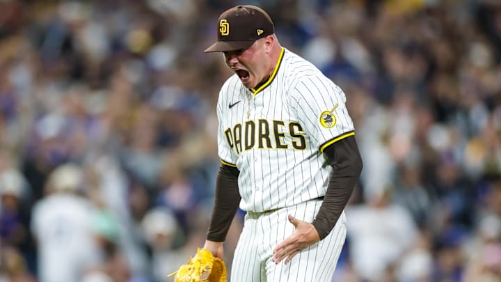 Jun 9, 2025; San Diego, California, USA; San Diego Padres relief pitcher Adrian Morejon (50) celebrates during the eighth inning against the Los Angeles Dodgers at Petco Park. Mandatory Credit: David Frerker-Imagn Images