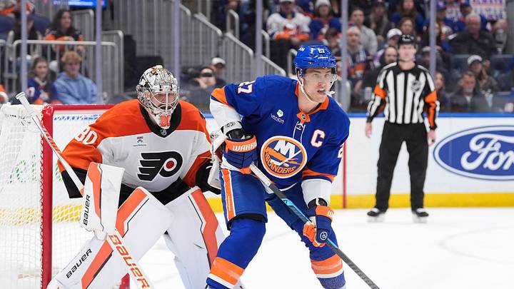 Philadelphia Flyers goaltender Dan Vladar and New York Islanders forward Anders Lee wait for the puck during the second period at UBS Arena. Mandatory Credit: Alexander Wohl-Imagn Images Philadelphia Flyers goaltender Dan Vladar and New York Islanders forward Anders Lee wait for the puck during the second period at UBS Arena. Mandatory Credit: Alexander Wohl-Imagn Images