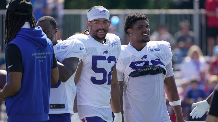 Buffalo Bills rookie linebacker Kaleb Elarms-Orr (52) chats with fellow rookie linebacker Theron Gaines (54) while at Buffalo's training camp practice at St. John Fisher University in Pittsford, New York, on Aug. 4, 2026. Buffalo Bills rookie linebacker Kaleb Elarms-Orr (52) chats with fellow rookie linebacker Theron Gaines (54) while at Buffalo's training camp practice at St. John Fisher University in Pittsford, New York, on Aug. 4, 2026.