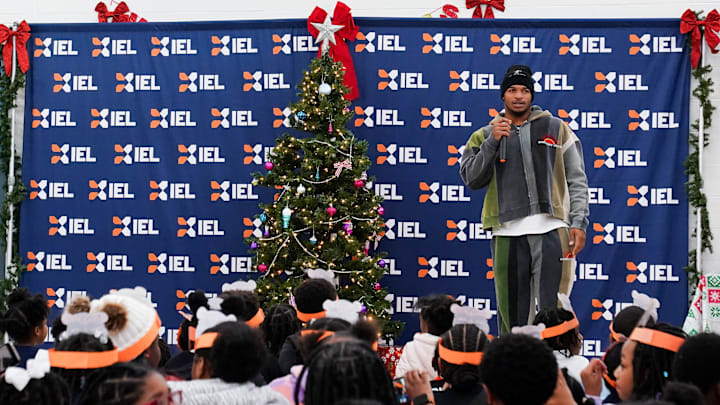 Cincinnati Bengals wide receiver Ja’Marr Chase greets children during a Christmas shopping event, Tuesday, Dec. 3, 2024, at Dudley S. Taft Boys & Girls Club in Avondale.