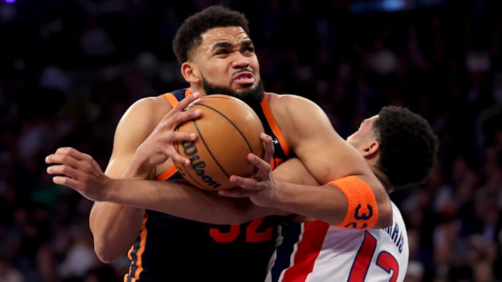 Apr 21, 2025; New York, New York, USA; New York Knicks center Karl-Anthony Towns (32) drives to the basket against Detroit Pistons forward Tobias Harris (12) during the third quarter of game two of the first round of the 2024 NBA Playoffs at Madison Square Garden. Mandatory Credit: Brad Penner-Imagn Images