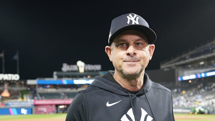 New York Yankees manager Aaron Boone (17) smiles following a win over the Kansas City Royals during game four of the ALDS for the 2024 MLB Playoffs at Kauffman Stadium on Oct 10. New York Yankees manager Aaron Boone (17) smiles following a win over the Kansas City Royals during game four of the ALDS for the 2024 MLB Playoffs at Kauffman Stadium on Oct 10.