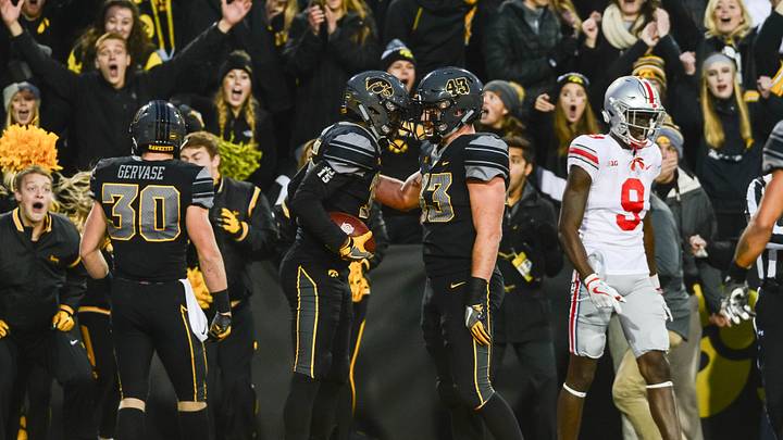 Nov 4, 2017; Iowa City, IA, USA; Iowa Hawkeyes defensive back Joshua Jackson (left) and linebacker Josey Jewell (right) celebrate in interception by Jackson during the game against the Ohio State Buckeyes at Kinnick Stadium. Iowa won 55-24. Mandatory Credit: Jeffrey Becker-USA TODAY Sports