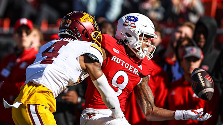 Nov 9, 2024; Piscataway, New Jersey, USA; Minnesota Golden Gophers defensive back Za'Quan Bryan (4) breaks up a pass intended for Rutgers Scarlet Knights wide receiver Ian Strong (9) during the first half at SHI Stadium. Mandatory Credit: Vincent Carchietta-Imagn Images Nov 9, 2024; Piscataway, New Jersey, USA; Minnesota Golden Gophers defensive back Za'Quan Bryan (4) breaks up a pass intended for Rutgers Scarlet Knights wide receiver Ian Strong (9) during the first half at SHI Stadium. Mandatory Credit: Vincent Carchietta-Imagn Images