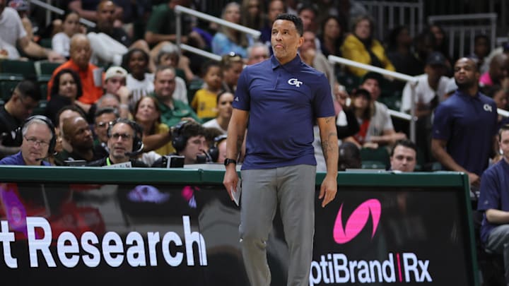 Feb 24, 2024; Coral Gables, Florida, USA; Georgia Tech Yellow Jackets head coach Damon Stoudamire looks on from the sideline against the Miami Hurricanes during the first half at Watsco Center. Mandatory Credit: Sam Navarro-Imagn Images