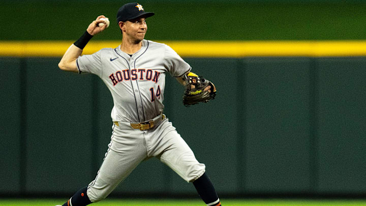 Houston Astros shortstop Mauricio Dubon (14) throws to first for an out ending the fifth inning of the MLB game between the Cincinnati Reds and Houston Astros at Great American Ball Park in Cincinnati on Wednesday, Sept. 4, 2024.