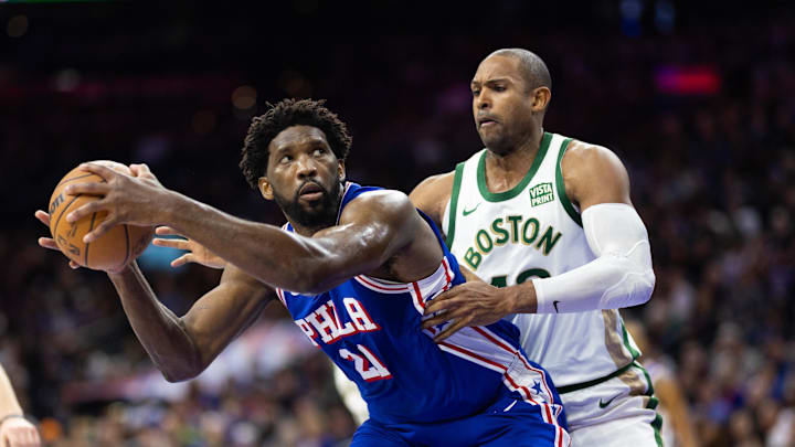 Nov 15, 2023; Philadelphia, Pennsylvania, USA; Philadelphia 76ers center Joel Embiid (21) controls the ball against Boston Celtics center Al Horford (42) during the third quarter at Wells Fargo Center. Mandatory Credit: Bill Streicher-Imagn Images