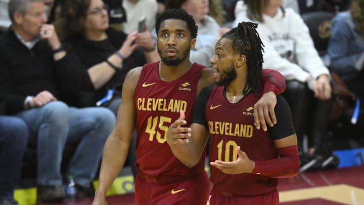 Apr 12, 2024; Cleveland, Ohio, USA; Cleveland Cavaliers guard Donovan Mitchell (45) and guard Darius Garland (10).