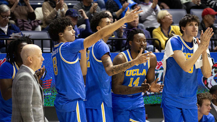 Feb 10, 2024; Berkeley, California, USA; The UCLA Bruins bench celebrates a 3-point basket against