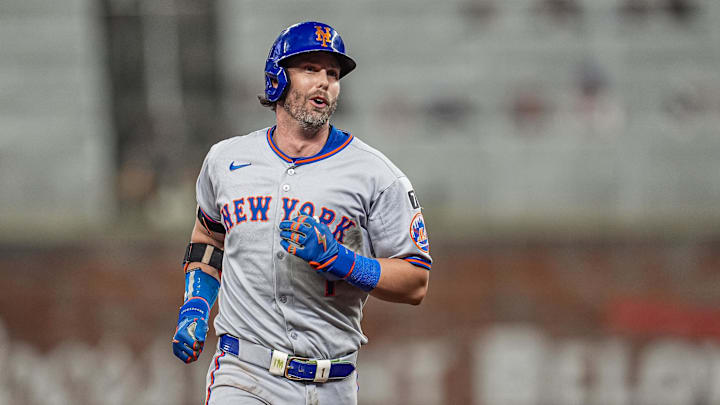 Aug 23, 2025; Cumberland, Georgia, USA; New York Mets second baseman Jeff McNeil (1) reacts after hitting a home run against the Atlanta Braves during the ninth inning at Truist Park. Mandatory Credit: Dale Zanine-Imagn Images