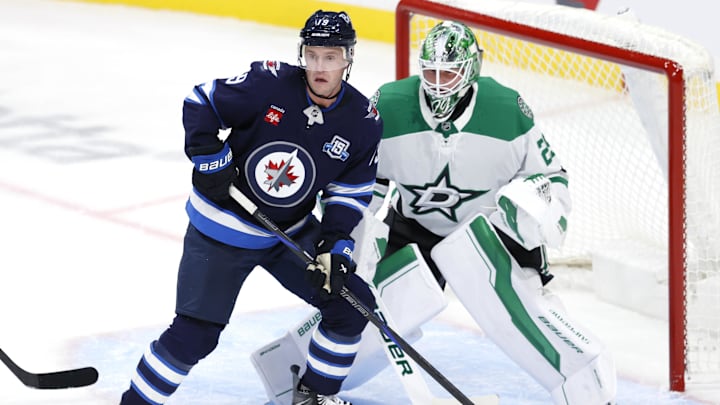 Oct 9, 2025; Winnipeg, Manitoba, CAN; Winnipeg Jets centre Jonathan Toews looks for a shot in front of Dallas Stars goaltender Jake Oettinger (29) in the second period at Canada Life Centre. Mandatory Credit: James Carey Lauder-Imagn Images