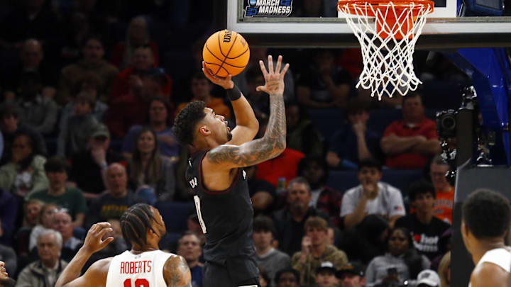 Mar 24, 2024; Memphis, TN, USA; Texas A&M Aggies guard Jace Carter (0) shoots against Houston