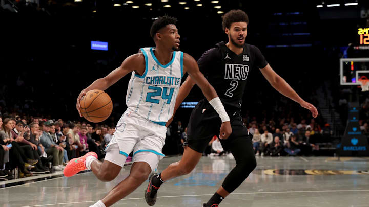 Nov 19, 2024; Brooklyn, New York, USA; Charlotte Hornets forward Brandon Miller (24) controls the ball against Brooklyn Nets forward Cameron Johnson (2) during the second quarter at Barclays Center. Mandatory Credit: Brad Penner-Imagn Images Nov 19, 2024; Brooklyn, New York, USA; Charlotte Hornets forward Brandon Miller (24) controls the ball against Brooklyn Nets forward Cameron Johnson (2) during the second quarter at Barclays Center. Mandatory Credit: Brad Penner-Imagn Images