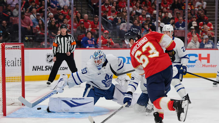 Feb 26, 2026; Sunrise, Florida, USA; Florida Panthers left wing Brad Marchand (63) scores against Toronto Maple Leafs goaltender Joseph Woll (60) during the first period at Amerant Bank Arena. Mandatory Credit: Sam Navarro-Imagn Images