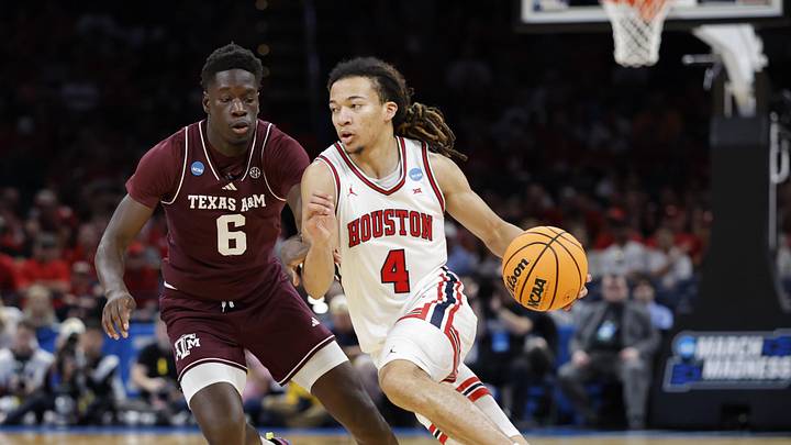 Mar 21, 2026; Oklahoma City, OK, USA; Houston Cougars guard Kingston Flemings (4) drives to the hoop past Texas A&M Aggies guard Ali Dibba (6) during the second half of a second round game of the men's 2026 NCAA Tournament at Paycom Center. Mandatory Credit: Alonzo Adams-Imagn Images