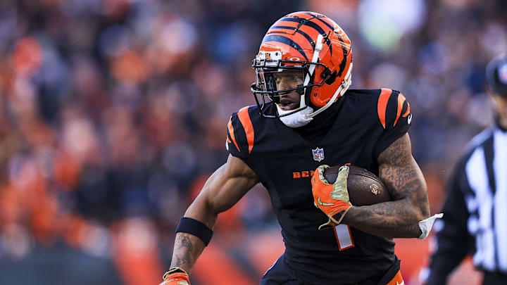 Dec 22, 2024; Cincinnati, Ohio, USA; Cincinnati Bengals wide receiver Ja'Marr Chase (1) runs with the ball against the Cleveland Browns in the second half at Paycor Stadium. Mandatory Credit: Katie Stratman-Imagn Images