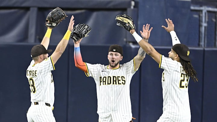 May 27, 2025; San Diego, California, USA; San Diego Padres outfielder Brandon Lockridge (28), left, Jackson Merrill (3), center, and Fernando Tatis Jr. (23) celebrate after the Padres beat the Miami Marlins 8-6 at Petco Park. Mandatory Credit: Denis Poroy-Imagn Images May 27, 2025; San Diego, California, USA; San Diego Padres outfielder Brandon Lockridge (28), left, Jackson Merrill (3), center, and Fernando Tatis Jr. (23) celebrate after the Padres beat the Miami Marlins 8-6 at Petco Park. Mandatory Credit: Denis Poroy-Imagn Images
