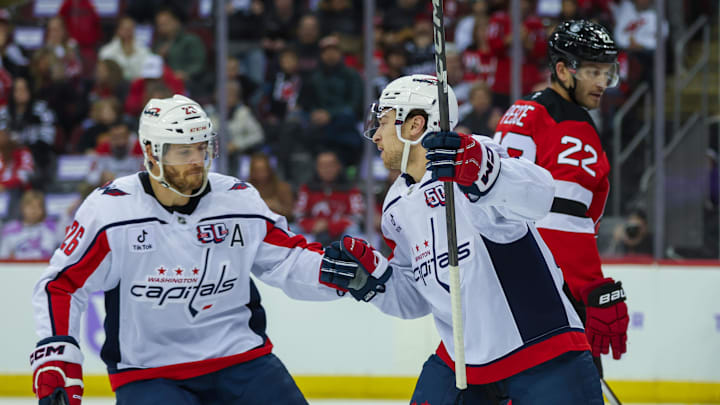 Andrew Mangiapane, Nic Dowd, Washington Capitals Mandatory Credit: Thomas Salus-Imagn Images