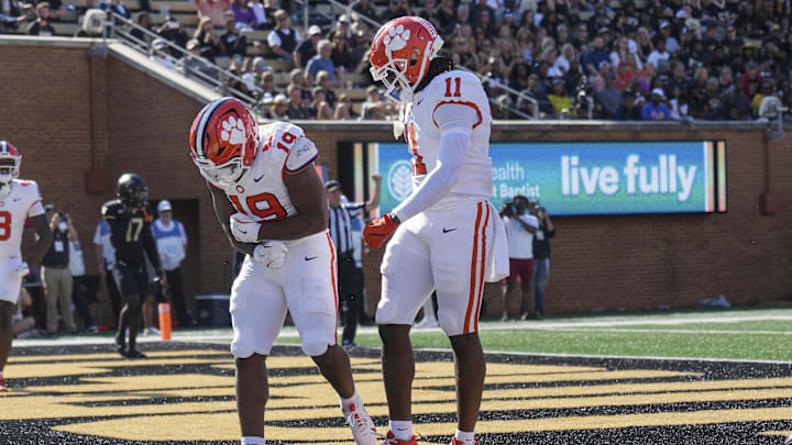 Oct 12, 2024; Winston-Salem, North Carolina, USA;  Clemson Tigers running back Keith Adams Jr. (19) celebrates his touchdown with tight end Olsen Patt-Henry (11) against the Wake Forest Demon Deacons during the second half at Allegacy Federal Credit Union Stadium. Mandatory Credit: Jim Dedmon-Imagn Images