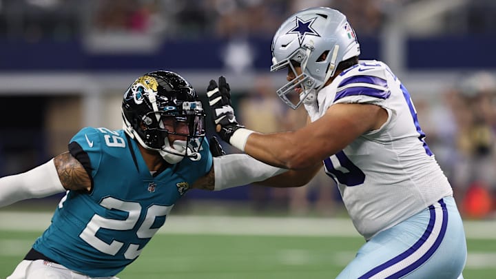 Aug 29, 2021; Arlington, Texas, USA; Dallas Cowboys guard Isaac Alarcon (60) blocks against Jacksonville Jaguars safety Josh Jones (29) at AT&T Stadium. Mandatory Credit: Matthew Emmons-Imagn Images