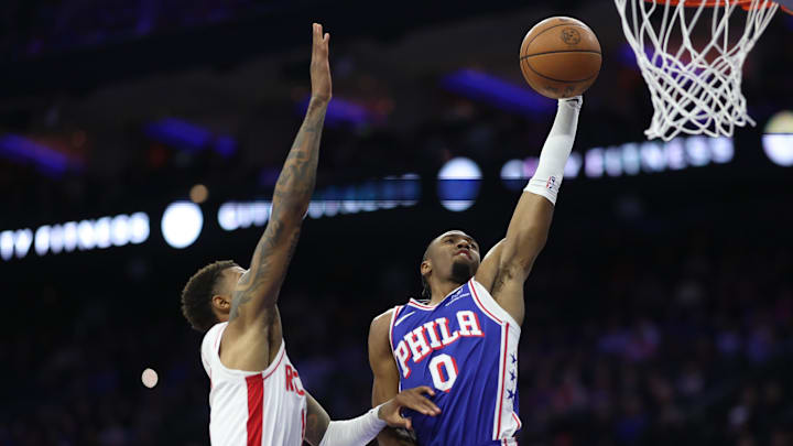 Jan 22, 2026; Philadelphia, Pennsylvania, USA; Philadelphia 76ers guard Tyrese Maxey (0) drives for a dunk against Houston Rockets forward Jabari Smith Jr. (10) during the second quarter at Xfinity Mobile Arena. Mandatory Credit: Bill Streicher-Imagn Images Jan 22, 2026; Philadelphia, Pennsylvania, USA; Philadelphia 76ers guard Tyrese Maxey (0) drives for a dunk against Houston Rockets forward Jabari Smith Jr. (10) during the second quarter at Xfinity Mobile Arena. Mandatory Credit: Bill Streicher-Imagn Images