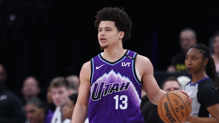 Jan 30, 2026; Salt Lake City, Utah, USA; Utah Jazz guard Walter Clayton Jr. (13) dribbles against the Brooklyn Nets during the first half at Delta Center. Mandatory Credit: Rob Gray-Imagn Images