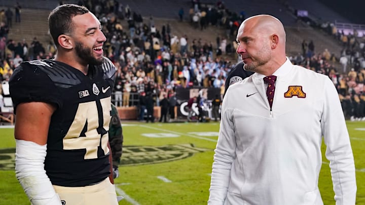 Nov 11, 2023; West Lafayette, Indiana, USA; Purdue Boilermakers running back Devin Mockobee (45) talks with Minnesota Golden Gophers head coach P.J. Fleck after defeating the Minnesota Golden Gophers at Ross-Ade Stadium. Mandatory Credit: Robert Goddin-Imagn Images Nov 11, 2023; West Lafayette, Indiana, USA; Purdue Boilermakers running back Devin Mockobee (45) talks with Minnesota Golden Gophers head coach P.J. Fleck after defeating the Minnesota Golden Gophers at Ross-Ade Stadium. Mandatory Credit: Robert Goddin-Imagn Images