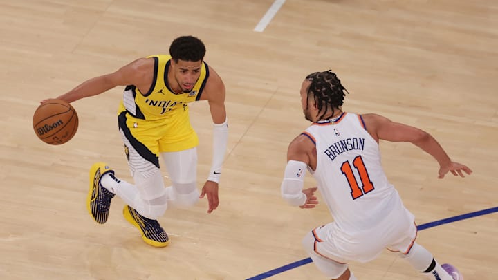 May 21, 2025; New York, New York, USA; Indiana Pacers guard Tyrese Haliburton (0) controls the ball against New York Knicks guard Jalen Brunson (11) in overtime during game one of the eastern conference finals for the 2025 NBA Playoffs at Madison Square Garden. Mandatory Credit: Brad Penner-Imagn Images