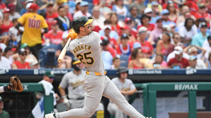 Jul 14, 2024; Philadelphia, Pennsylvania, USA; Oakland Athletics outfielder Brent Rooker (25) hits a two-run home run against the Philadelphia Phillies during the sixth inning at Citizens Bank Park. Mandatory Credit: Eric Hartline-USA TODAY Sports Jul 14, 2024; Philadelphia, Pennsylvania, USA; Oakland Athletics outfielder Brent Rooker (25) hits a two-run home run against the Philadelphia Phillies during the sixth inning at Citizens Bank Park. Mandatory Credit: Eric Hartline-USA TODAY Sports