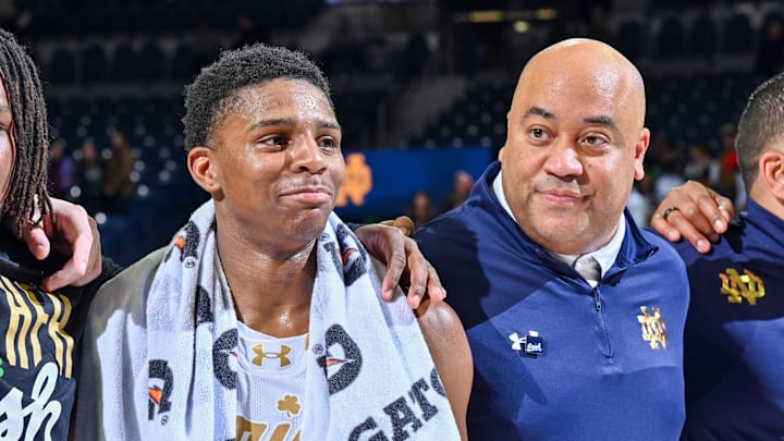 Notre Dame Fighting Irish guard Markus Burton (3) and head coach Micah Shrewsberry