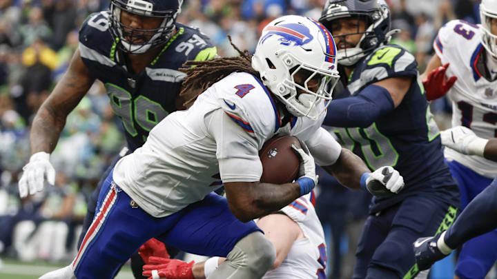 Oct 27, 2024; Seattle, Washington, USA; Buffalo Bills running back James Cook (4) rushes for a touchdown against the Seattle Seahawks during the fourth quarter at Lumen Field. Mandatory Credit: Joe Nicholson-Imagn Images Oct 27, 2024; Seattle, Washington, USA; Buffalo Bills running back James Cook (4) rushes for a touchdown against the Seattle Seahawks during the fourth quarter at Lumen Field. Mandatory Credit: Joe Nicholson-Imagn Images