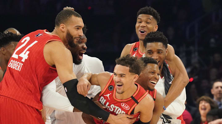 Feb 16, 2020; Chicago, Illinois, USA; Team Giannis guard Trae Young of the Atlanta Hawks celebrates with teammates after making a shot at the halftime buzzer during the 2020 NBA All Star Game at United Center. Mandatory Credit: Kyle Terada-Imagn Images Feb 16, 2020; Chicago, Illinois, USA; Team Giannis guard Trae Young of the Atlanta Hawks celebrates with teammates after making a shot at the halftime buzzer during the 2020 NBA All Star Game at United Center. Mandatory Credit: Kyle Terada-Imagn Images