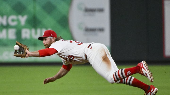 Aug 12, 2025; St. Louis, Missouri, USA; St. Louis Cardinals second baseman Brendan Donovan (33) dives and catches a line drive hit by Colorado Rockies center fielder Brenton Doyle (not pictured) during the seventh inning at Busch Stadium. Mandatory Credit: Jeff Curry-Imagn Images Aug 12, 2025; St. Louis, Missouri, USA; St. Louis Cardinals second baseman Brendan Donovan (33) dives and catches a line drive hit by Colorado Rockies center fielder Brenton Doyle (not pictured) during the seventh inning at Busch Stadium. Mandatory Credit: Jeff Curry-Imagn Images