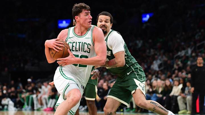 Feb 1, 2026; Boston, Massachusetts, USA; Boston Celtics center Luka Garza (52) drives to the basket while Milwaukee Bucks guard Cole Anthony (50) defends during the second half at TD Garden. Mandatory Credit: Bob DeChiara-Imagn Images Feb 1, 2026; Boston, Massachusetts, USA; Boston Celtics center Luka Garza (52) drives to the basket while Milwaukee Bucks guard Cole Anthony (50) defends during the second half at TD Garden. Mandatory Credit: Bob DeChiara-Imagn Images